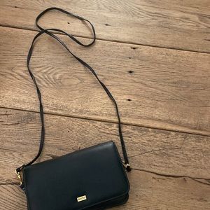 Never used button cross body with check book cover